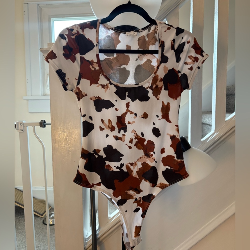 Le Lis Collection Cow Print Body Suit